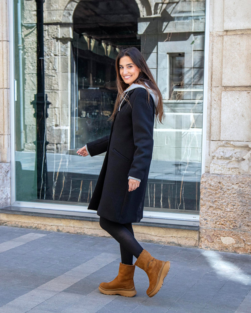 Hebe botas de piel con forro interior de pelo. cuero